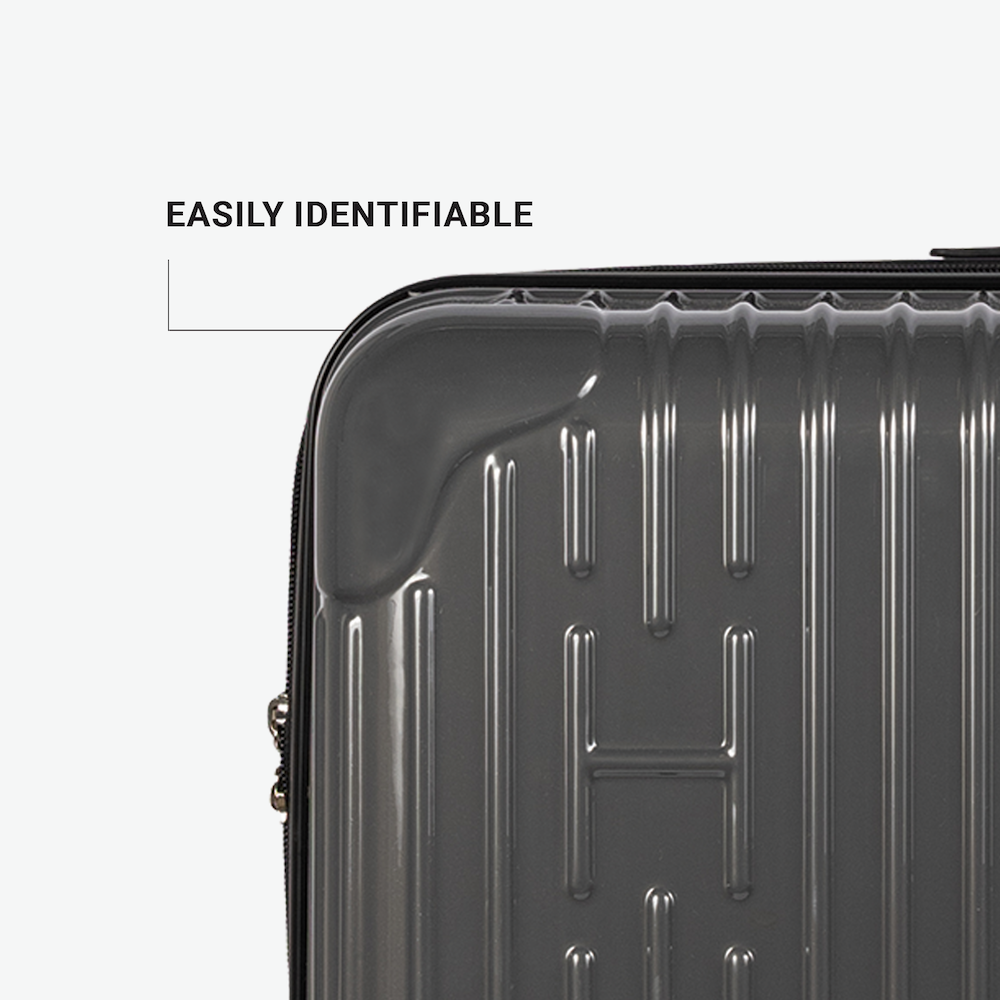 Hotel Collection Carry-On Luggage available in distinctive, stylish colors for easy identification on the baggage carousel and a touch of luxury on the go.